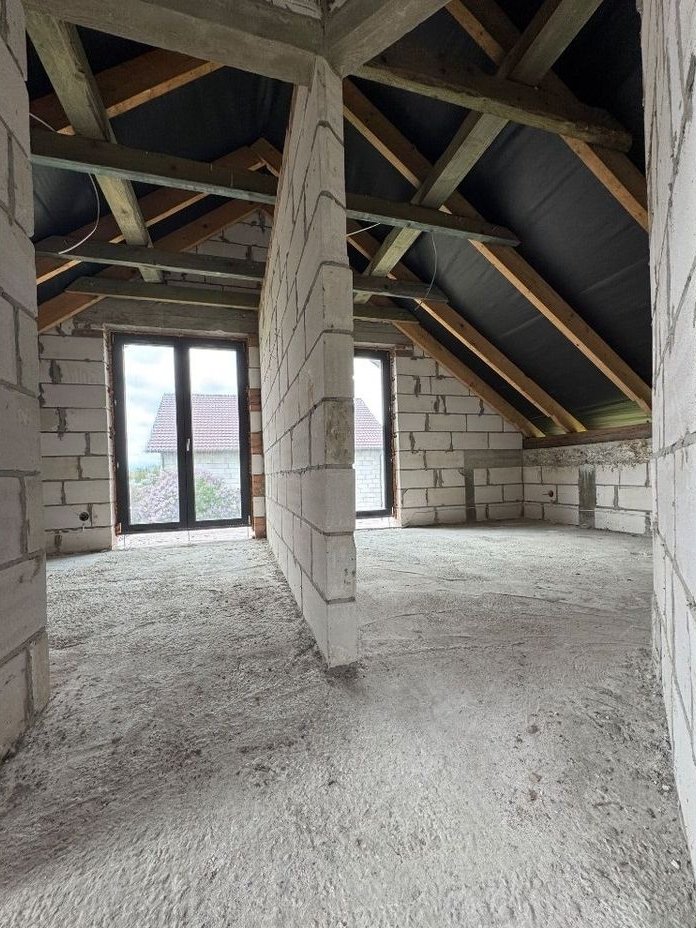 Dom z garażem w stanie surowym zamkniętym Szopinek