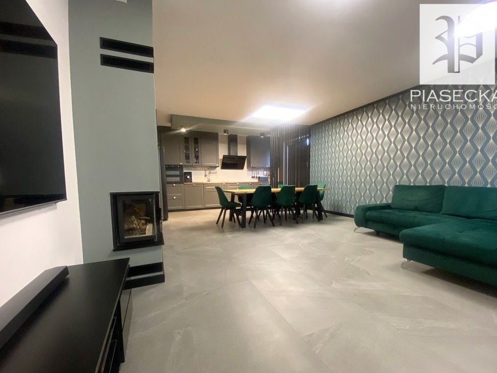 Dom do zamieszkania z tarasem, ogrodem i garażem