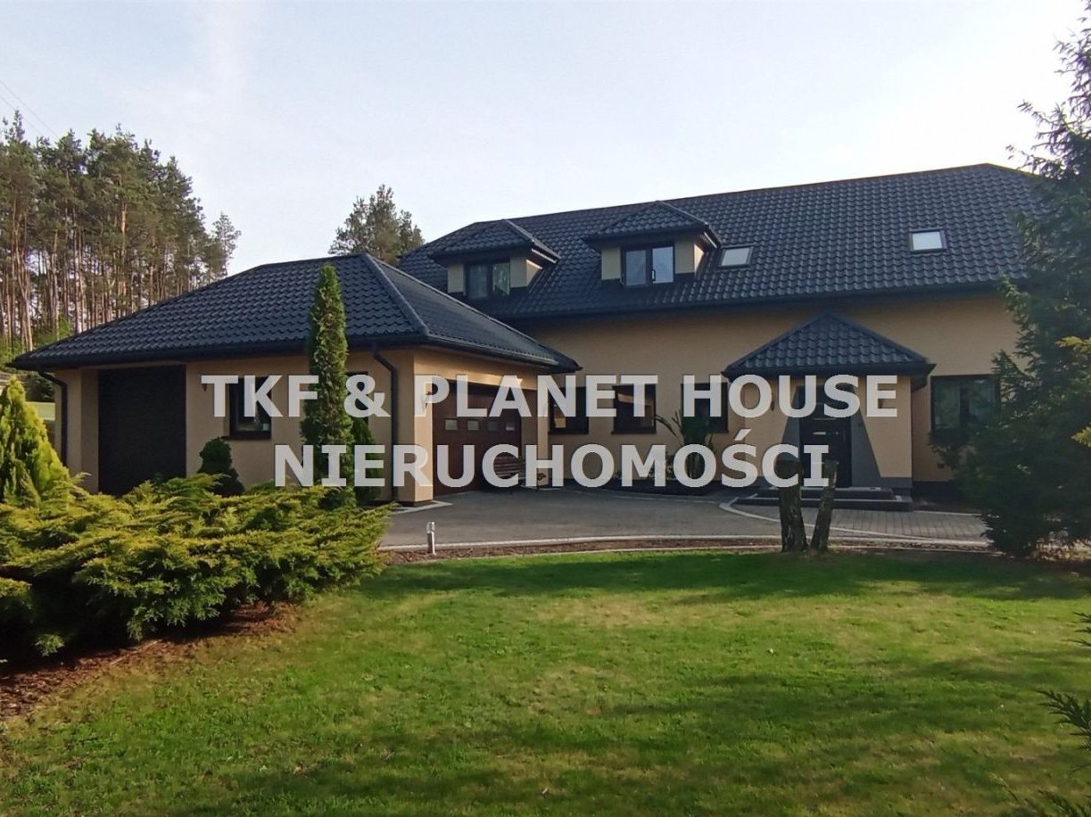 Dom do wprowadzenia z halą usługową Podkonice Duże