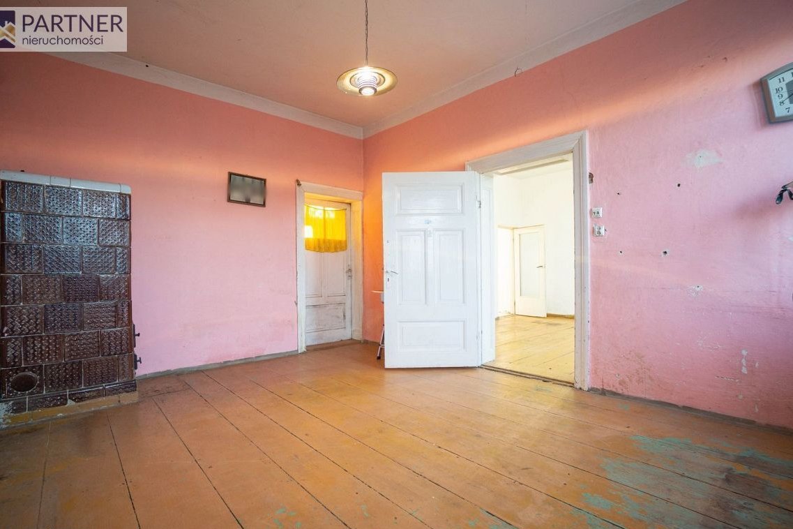 Dom z zabudowaniami na dz. 4 400 m2 (udział 1/2)