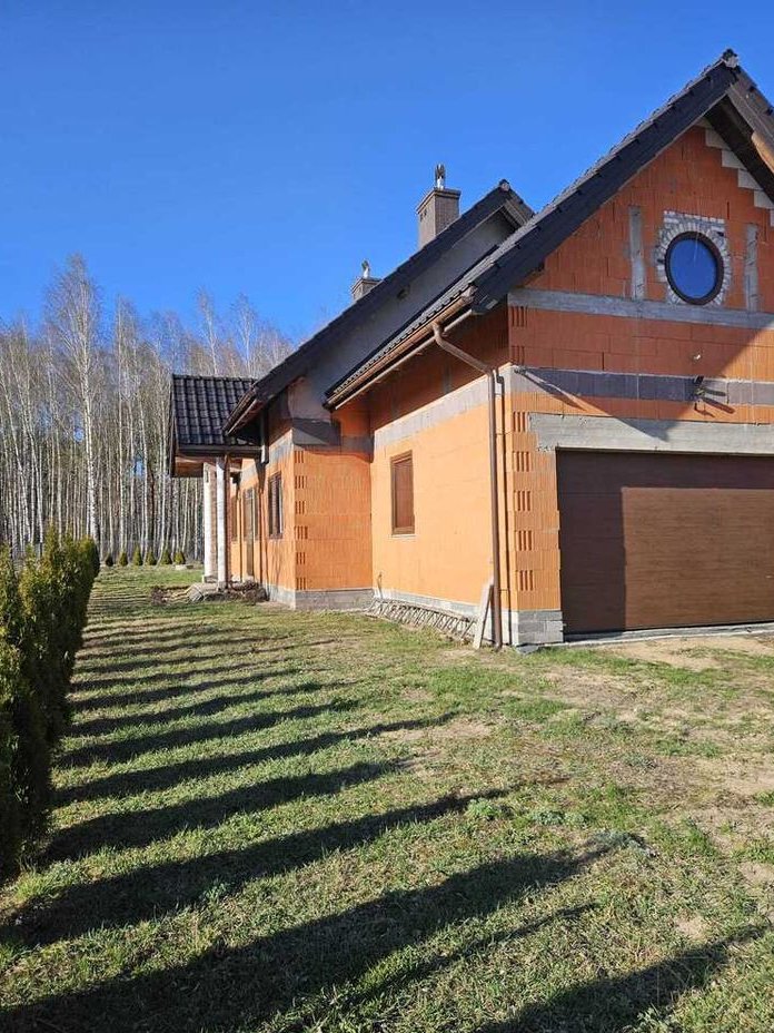 Dom piętrowy w stanie surowym zamkniętym - 260 m²