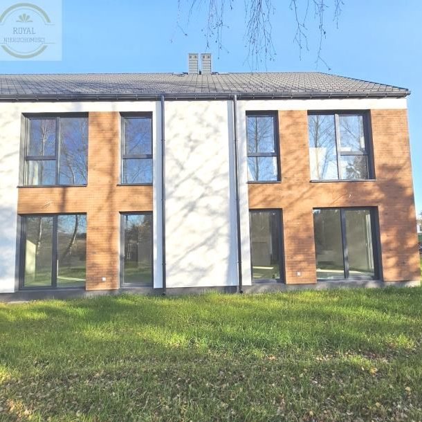 Skrajny segment z garażem i ogrodem