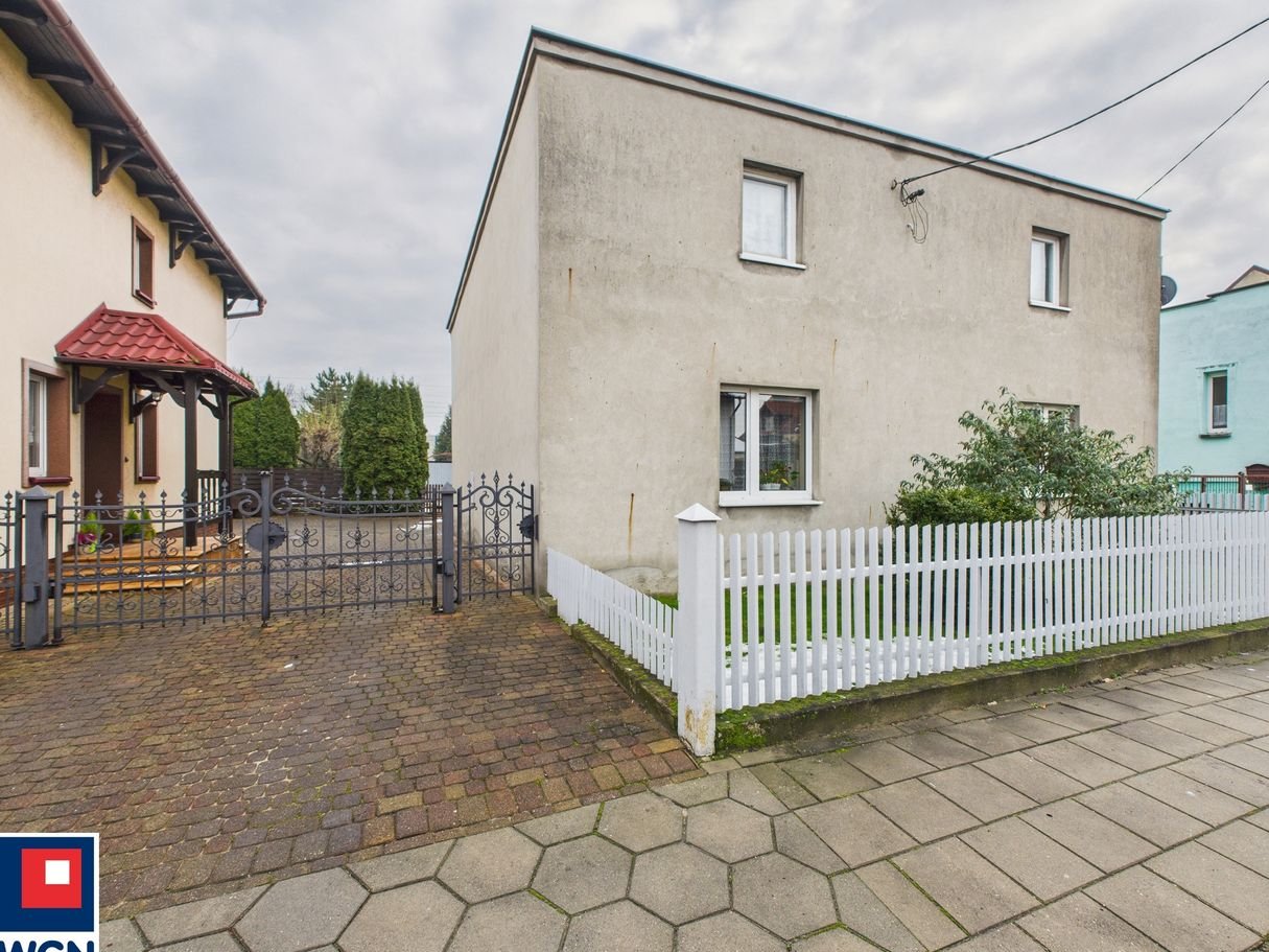 Atrakcyjny dom w spokojnej dzielnicy miasta z dużą działką w Kościanie