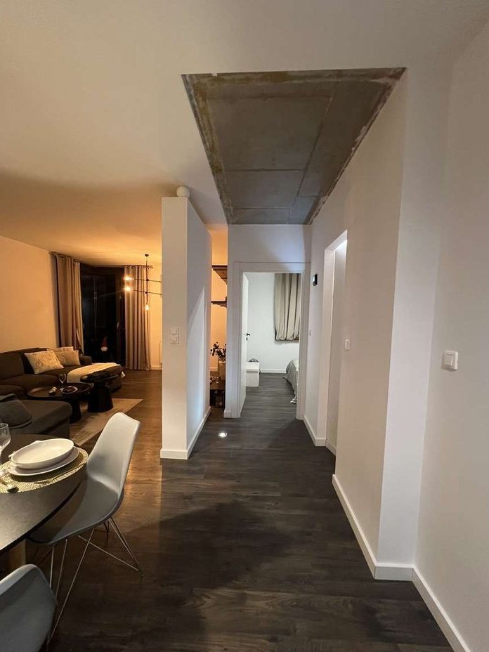 Dwupoziomowe mieszkanie z tarasem na dachu.