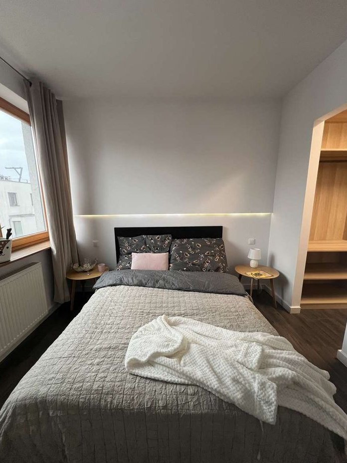 Dwupoziomowe mieszkanie z tarasem na dachu.