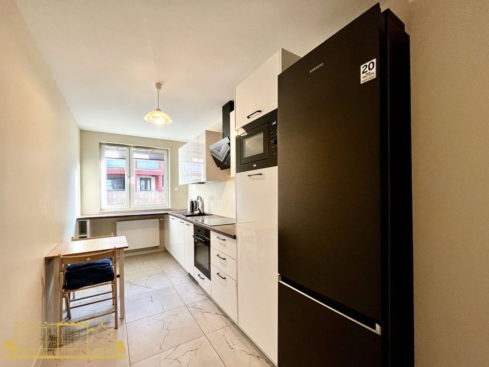 Nowoczesne 2-pokojowe mieszkanie z garażem i ogródkiem