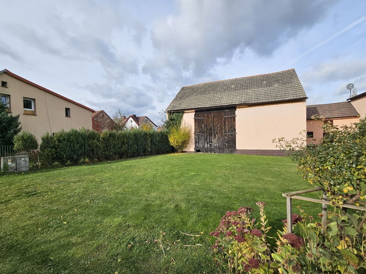 Dom z zabudowaniami gospodarczymi