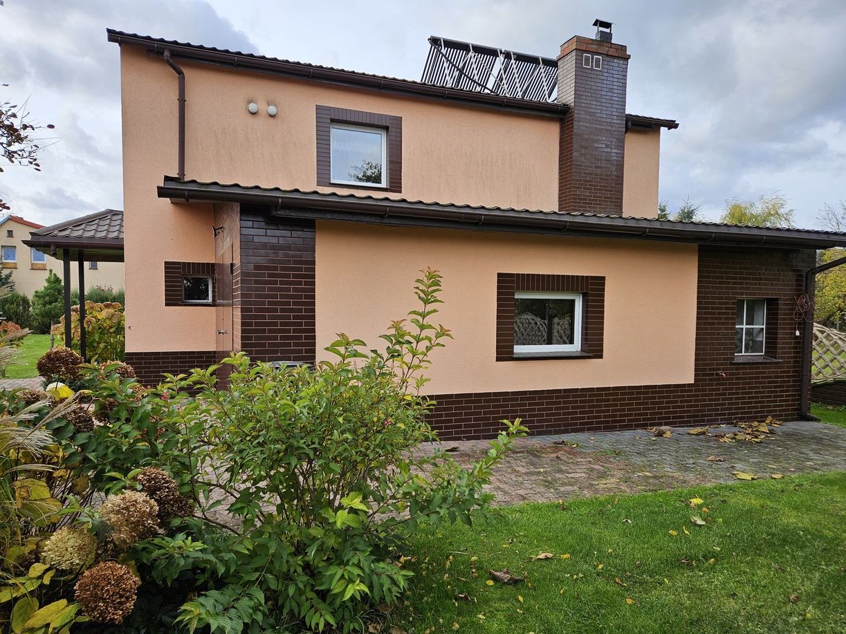 Dom z zabudowaniami gospodarczymi