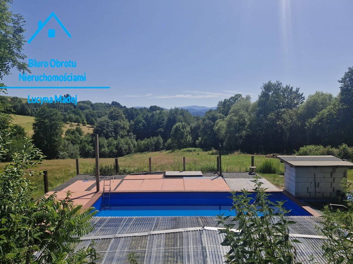 Dom 100mkw. z basenem w ładnym miejscu i 1.50 ha działki.