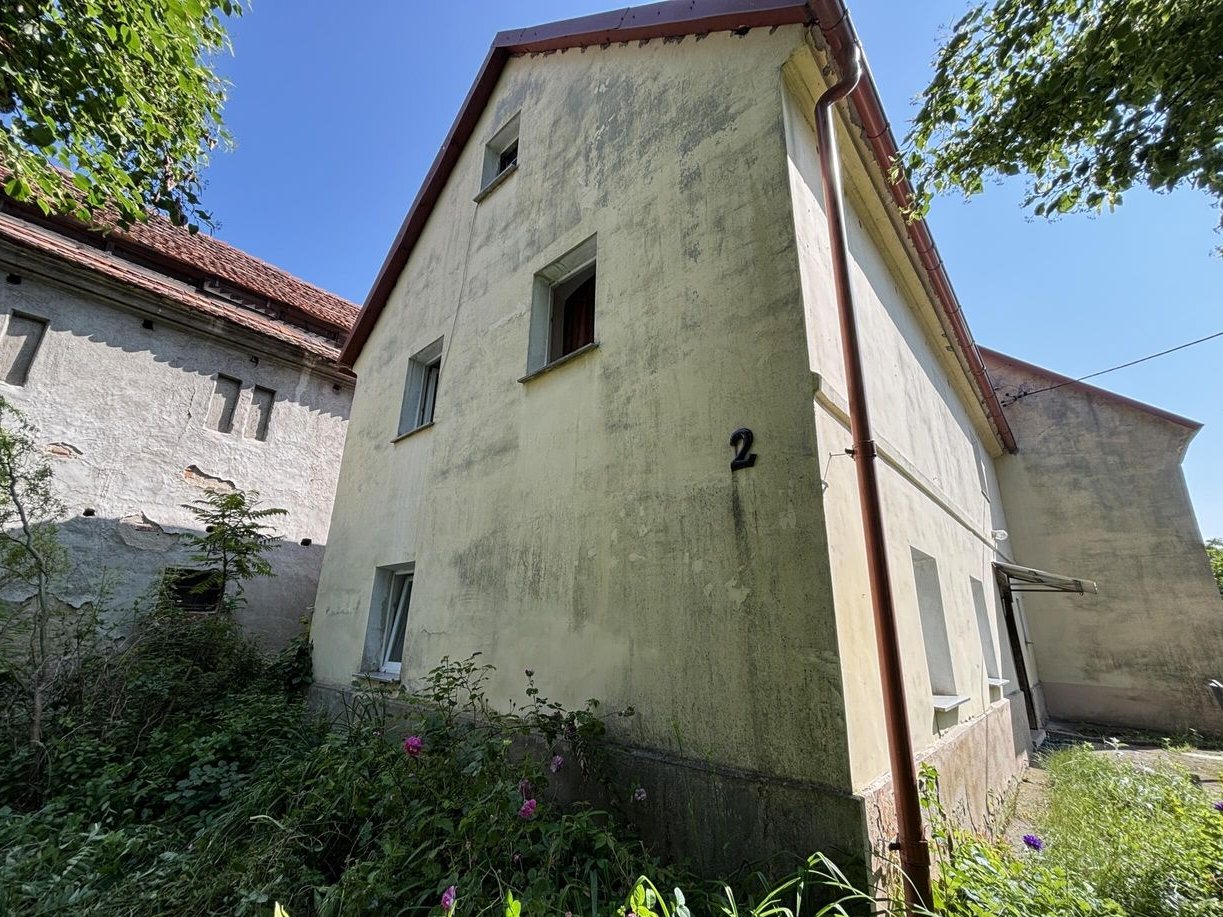 Dom z zabudowaniami gospodarczymi!