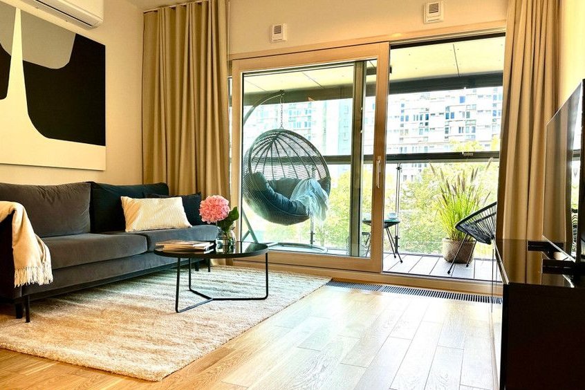 Trzypokojowy apartament w Mennica Residence