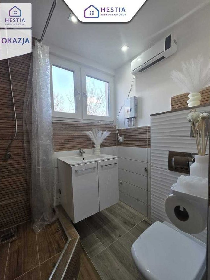 Kawalerka po remoncie z ogrodem