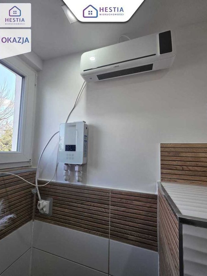 Kawalerka po remoncie z ogrodem